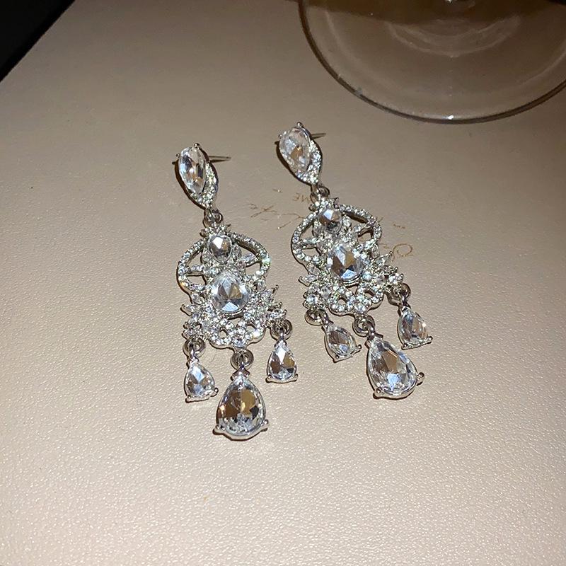 Серьги-кисточки с бриллиантами в виде цветков «Серебряная игла» класса люкс 2025 - Элегантный европейский и американский стиль для женщин