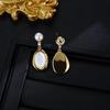 Серьги-подвески из серебра 925 пробы с натуральным перламутром и пресноводным жемчугом