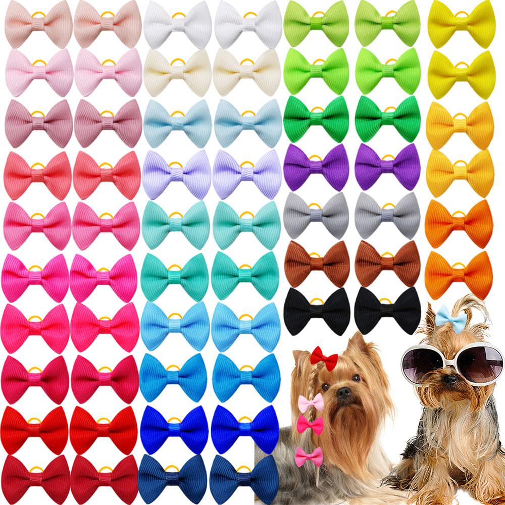 100PCS New Dog Bows With Rubber Bands Solid Polka Dot Style Handmade Puppy Bows Hair Supplies Pet Grooming Accessories For Dogs