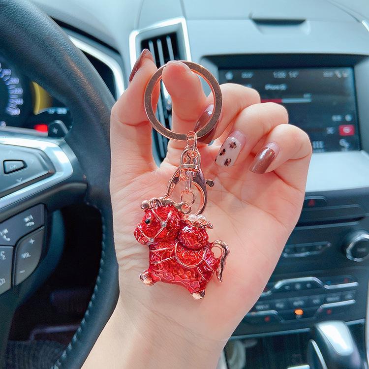 "2023 Red Series God of Wealth Keychain: Creative Money Bag for Car Keys, Annual Meeting Gift with Custom Logo Engraving"