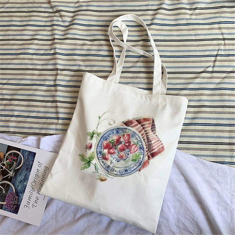 2022 Лето Новая женская дизайнерская сумка с мультяшным принтом Женская белая простая сумка через плечо Большой емкости Повседневная сумка Холст H