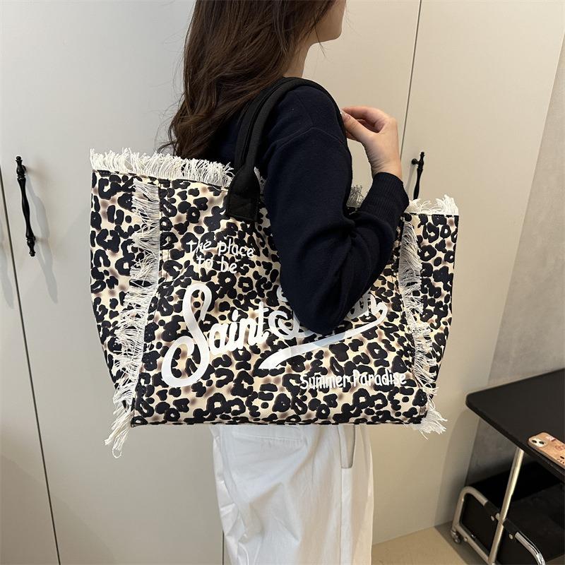 Новая женская парусиновая сумка большой вместимости с леопардовым принтом для отдыха и путешествий Новая сумка ручной работы с кисточкой Сумка-тоут на одно плечо
