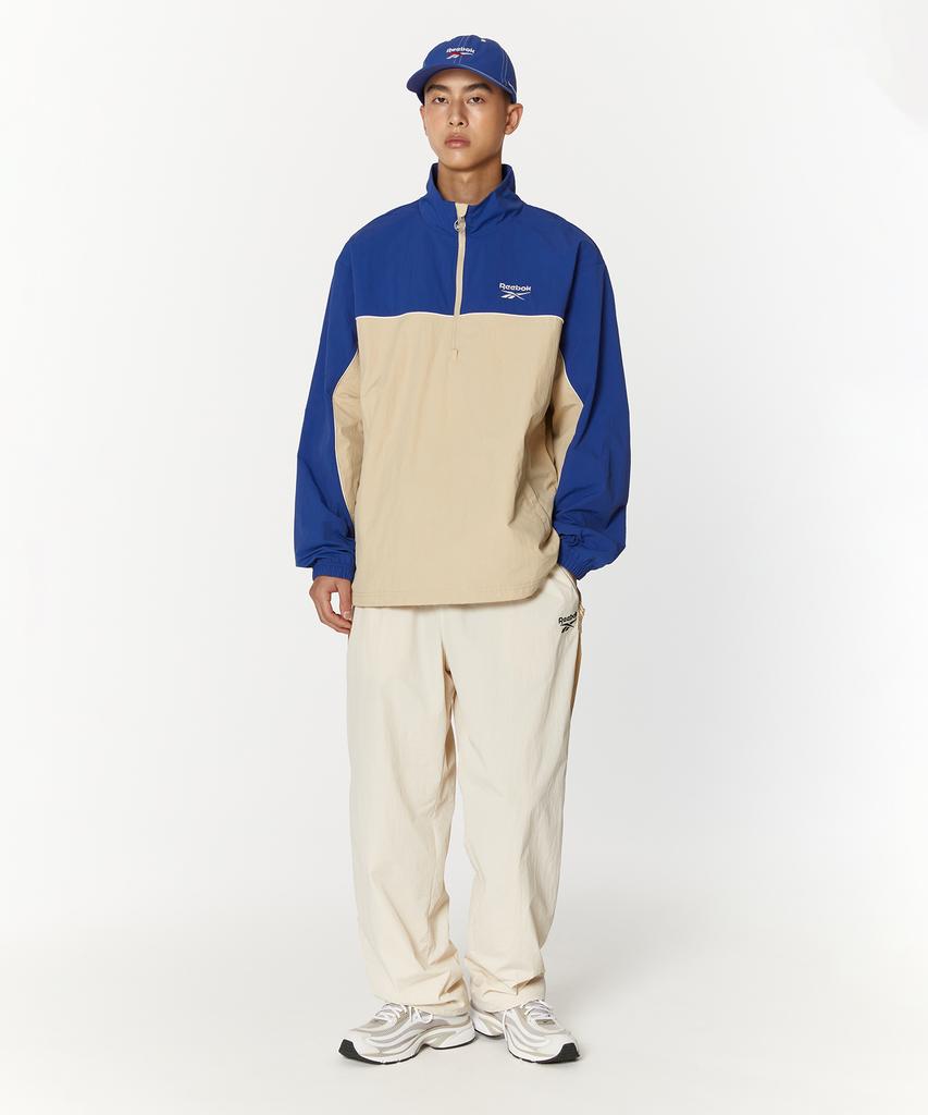 Reebok Теплые брюки Vector Flash 2-Way - Бежевые