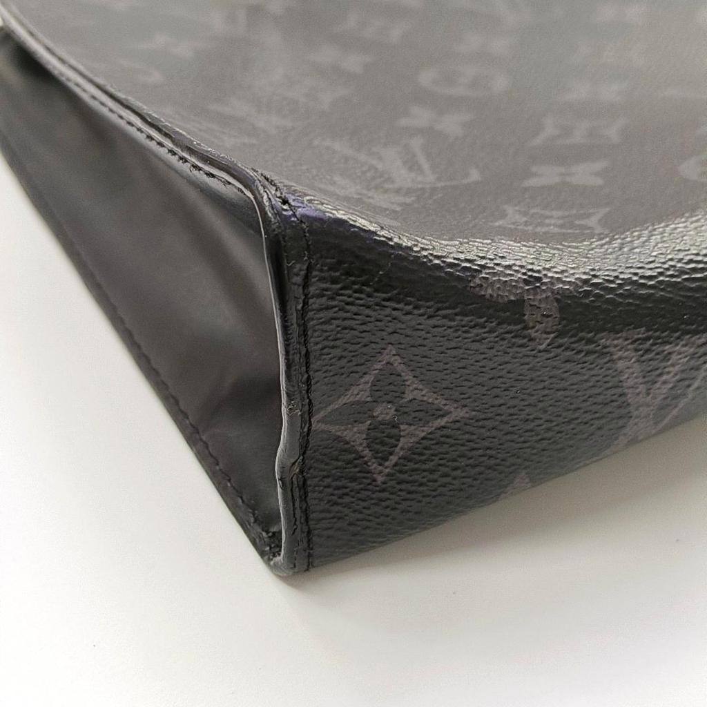 [Б/У] Louis Vuitton Pochette Voyage MM 'Черный холст Monogram Eclipse' - Хорошее состояние #1WAFRJE