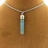 Stones and Minerals. Raw Neon Blue Apatite Necklace. Tube Model. Color Silver.