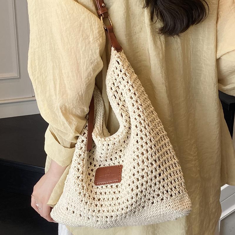Woven hollow bag women's 2025 new summer seaside vacation travel tote bag beach bag armpit bag