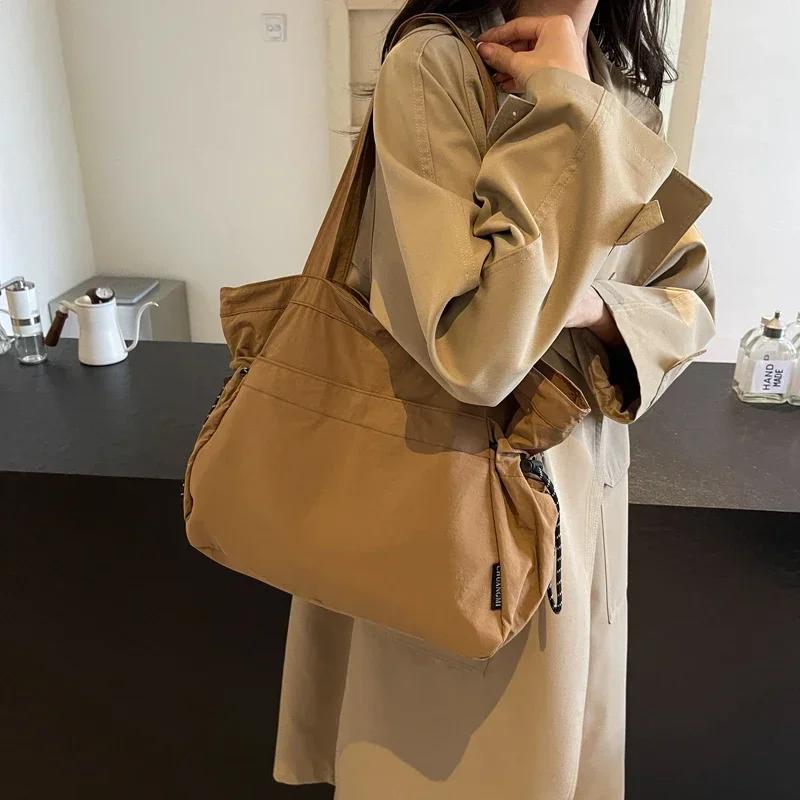 Повседневная холщовая сумка-тоут для женщин, новая дорожная сумка, легкая и вместительная, универсальная, популярная сумка через плечо