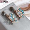 Женские серьги Kinel с синим камнем и кристаллами в виде цветка на английском языке