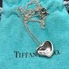 Б/у [Исключительно хорошее состояние] Tiffany & Co. Серебряное колье с изогнутым сердцем Оценено