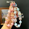 Расписанные вручную бусины Цепочка для телефона Милый кулон в виде куклы Брелок Защита от потери Ремешок на запястье Браслет Декор для чехла для наушников/сумки