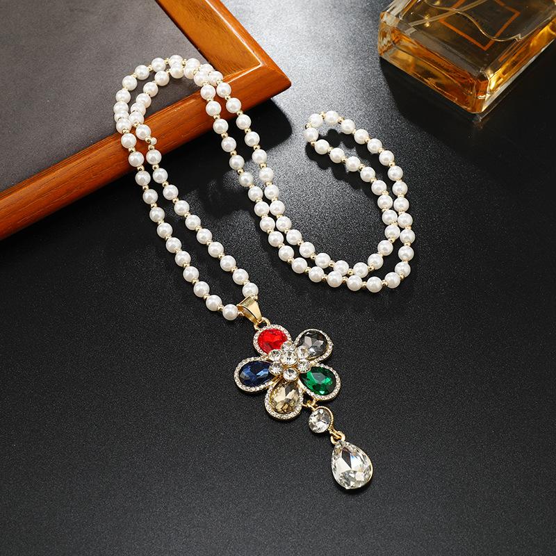 Длинное и изысканное колье, хрустальный кулон, цепочка для свитера, высококачественное и универсальное колье, простые и высококачественные аксессуары для цепочки для свитера.