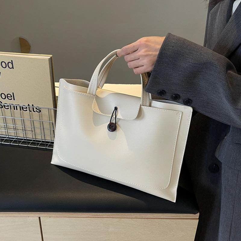 Сумка женская большой вместимости 2025 новая модная с ощущением высокого класса зарубежная универсальная ручная сумка популярная портативная сумка-тоут для компьютера