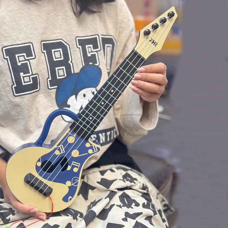 Дети могут щипать струны и играть в игрушки Yukrili для начинающих, гитарные головоломки и музыкальные инструменты