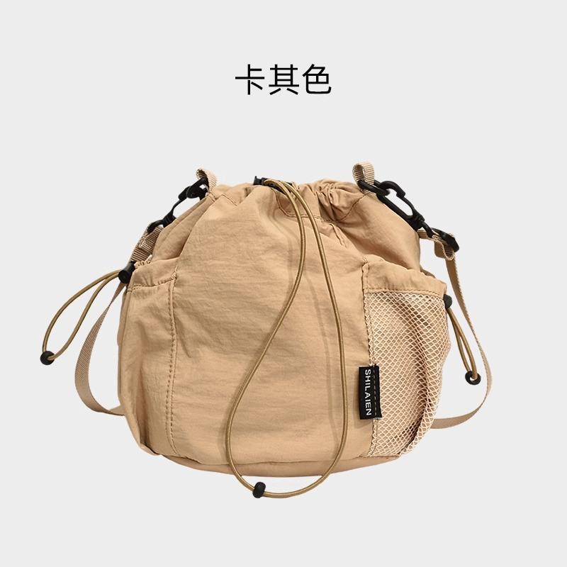 Повседневная мини-сумка кроссбоди женская нишевая легкая сумка 2025 новая сумка для мобильного телефона универсальная сумка-ведро на шнурке