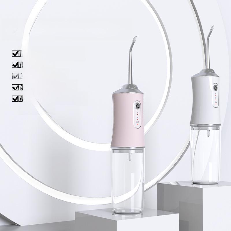 Портативный электрический ирригатор: Очиститель зубов и спрей для ухода за полостью рта.