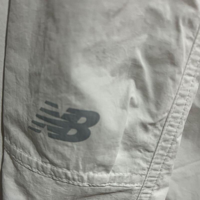 New Balance W Breeze Легкие парашютные брюки Белые nbntg2W512