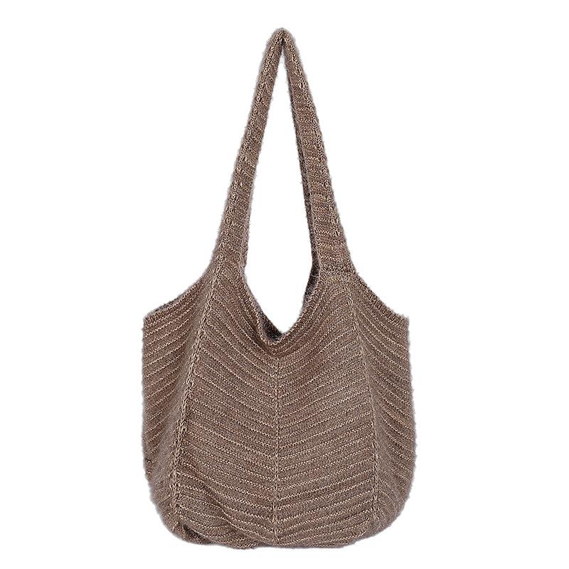 Korean lazy style large capacity retro solid color knitted tote bag niche fashion resort style woven armpit bag for women