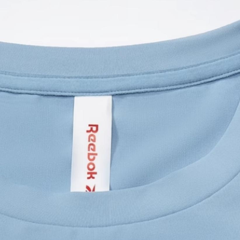 Reebok Однотонная спортивная повседневная трикотажная футболка с коротким рукавом для фитнеса и тренировок, женские топы синего и фиолетового цвета 24SRM406WGB4
