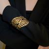 Металлические браслеты-манжеты с полыми листьями для женщин, простой элегантный стиль, браслет с преувеличенным дизайном, высококачественная регулируемая манжета, готический циркон