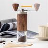 Portable, compact, hand-held coffee grinder with ceramic mortar, 5-degree adjustable grinding angle, washable clear container, natural wood finish,