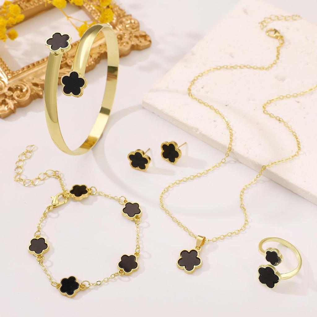 Комплект украшений «Цветок на удачу»: Браслет, серьги, ожерелье и кольцо с пятилистным клевером для женщин.