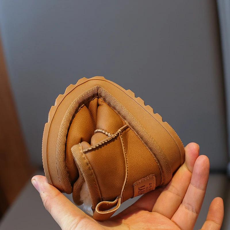 2024 Детские теплые зимние ботинки для девочек и мальчиков. Зимняя новая мода. Мягкие удобные нескользящие повседневные универсальные шикарные ботинки.