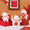 There Are Various Types of Home Decorations Such As The Lucky Cat Ornaments, Festive Tablecloths, and Resin Handicrafts for The Entrance Hall