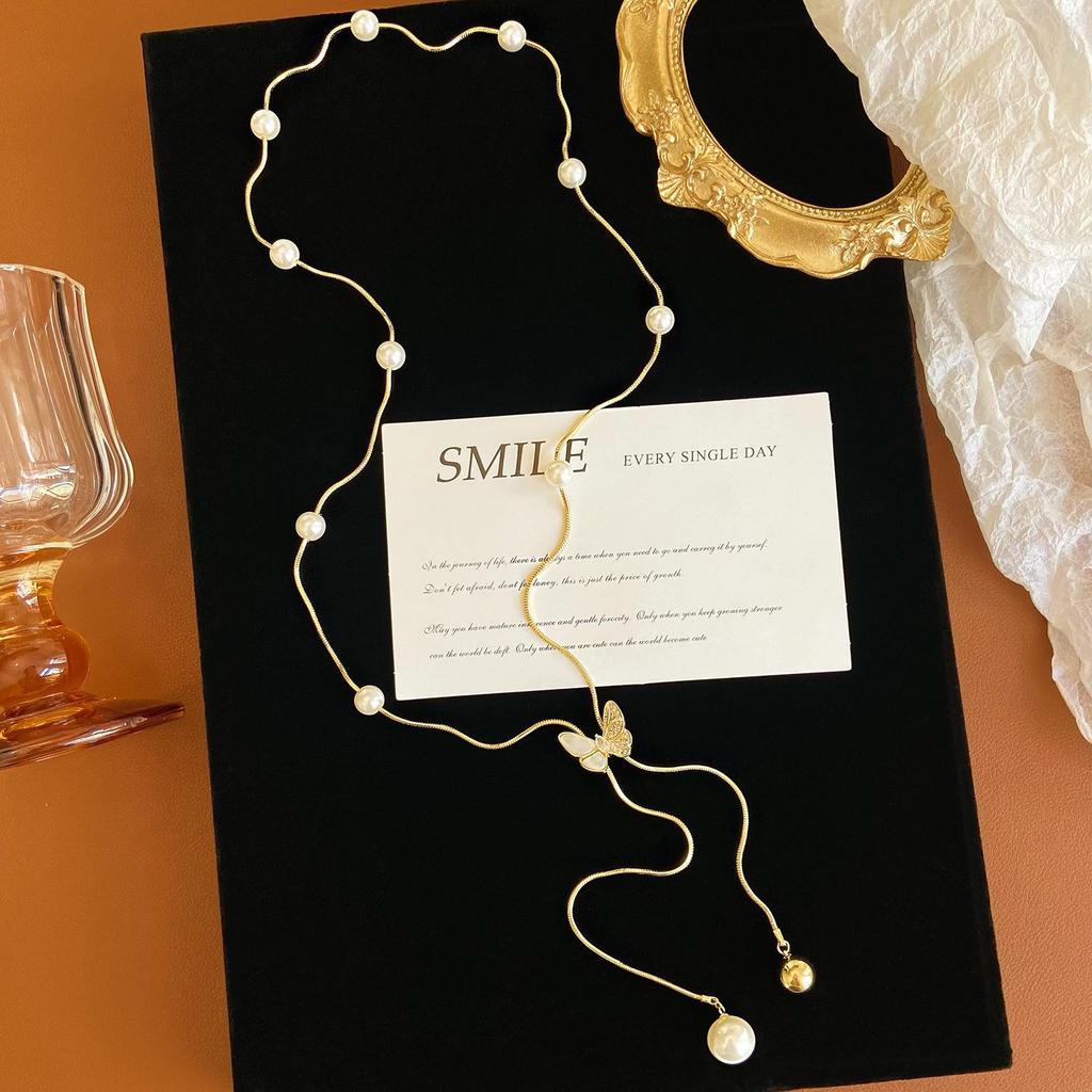 Длинное жемчужное колье-свитер с бабочкой – Элегантный осенне-зимний аксессуар 2025 года для женщин и девушек