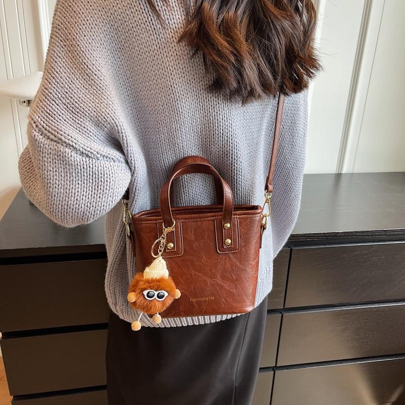 IELGY Fashionable Versatile Shoulder Messenger Bag, Textured Explosive Portable Bucket Bag