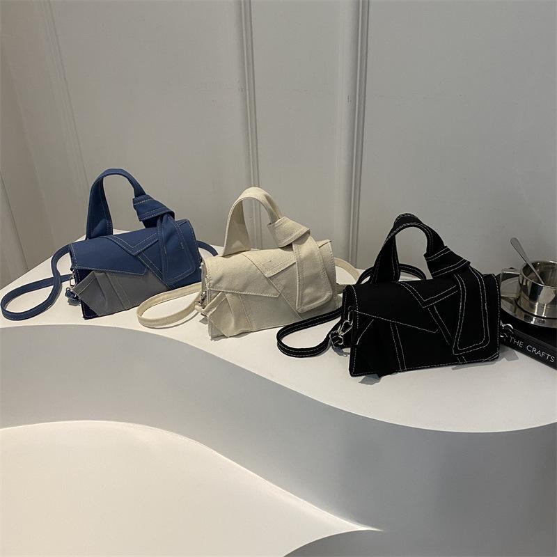 Дизайн-чувственная женская сумка Новый стиль индивидуальности Контрастная цветная сумка через плечо Сумка через плечо Niche Design Trendy Handbag