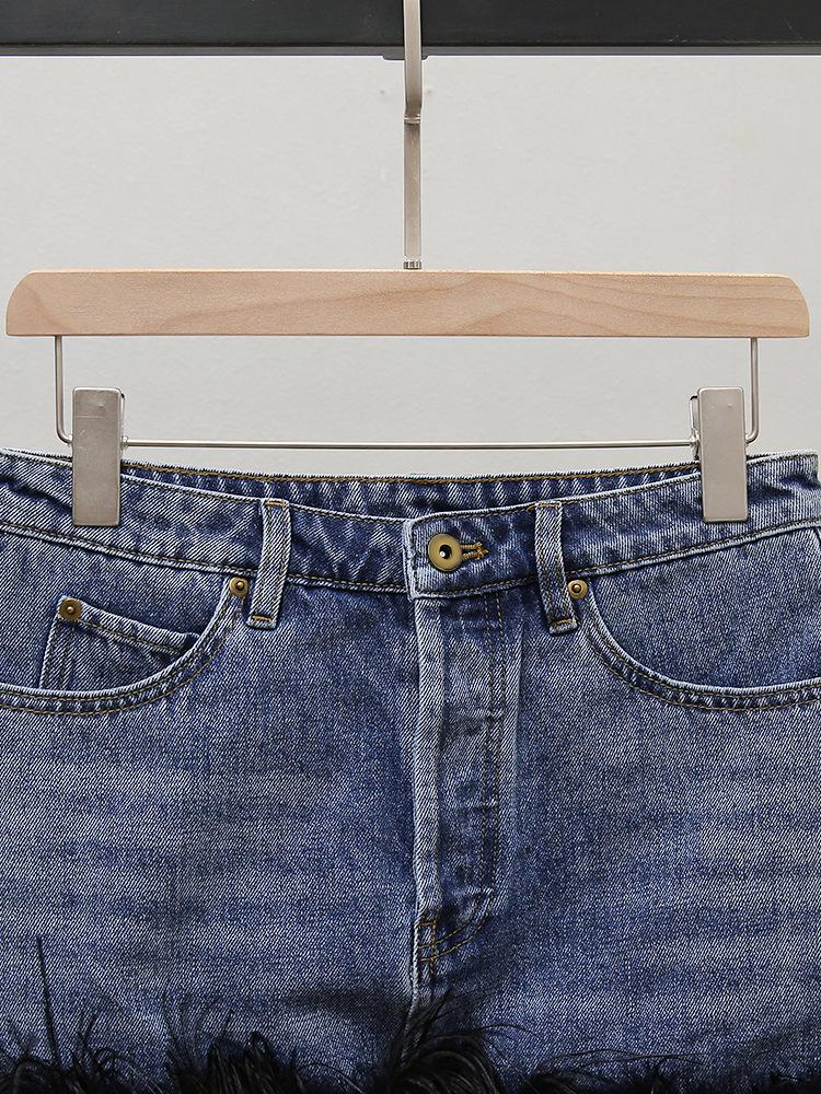 Осенняя французская юбка миди из денима с перьями