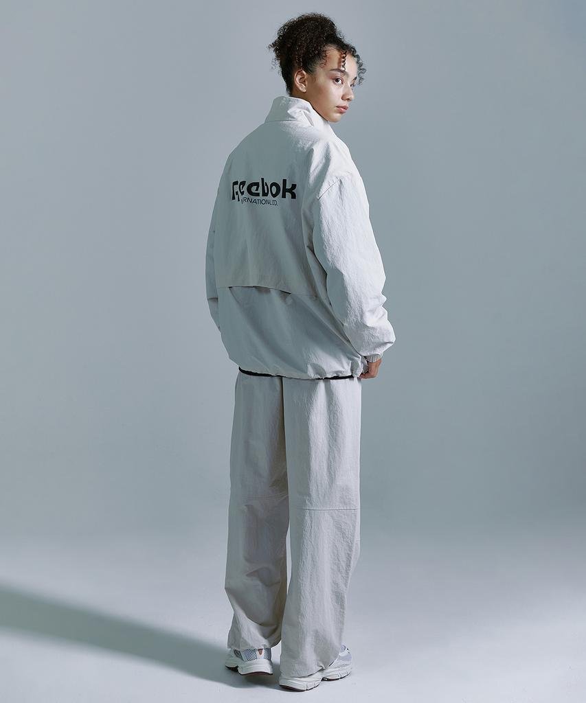 Reebok Теплые штаны Essentials - Бежевые