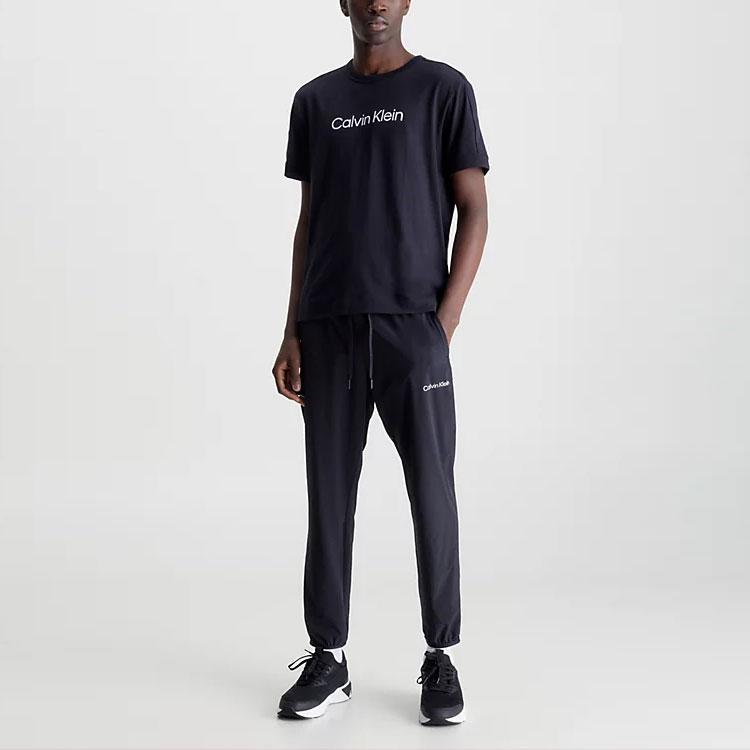 Calvin Klein SS23 Футболка с круглым вырезом и коротким рукавом с принтом букв, мужские топы, черная 00GMS3K104-BAE