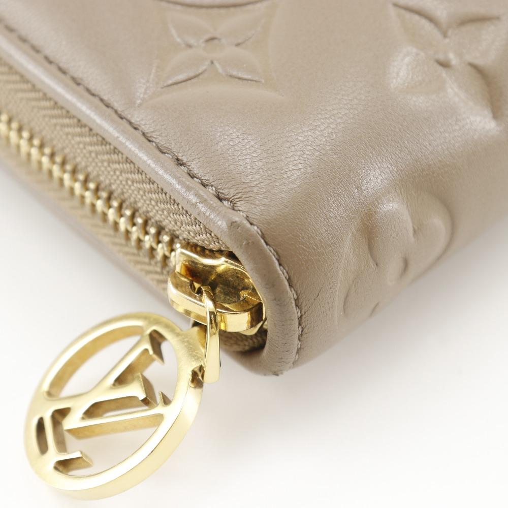 Louis Vuitton Zippy Wallet Purse M81511 Monogram Coussin Taupe Beige Lambskin Women Used