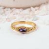 Vintage Gold Amethyst Marquise Ring: Delicate Purple Navette Gemstone and Ornate Filigree Band, Perfect for Stacking.