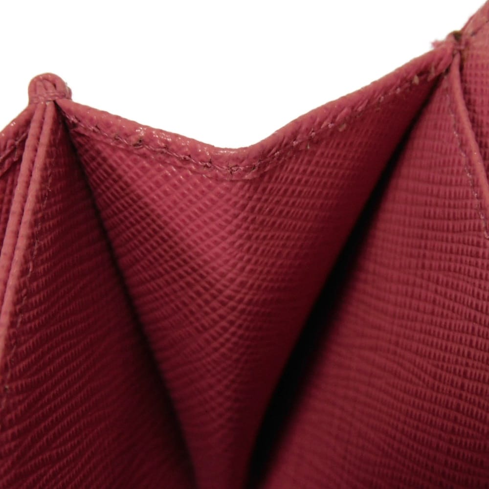 Подержанный 11569 Кошелек для монет Saffiano 1MM268 QHH F0505 7943 Розовый Картхолдер на молнии с треугольным логотипом Peonia Женский от