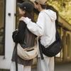 Korean Version of Couple Casual Small Bag Women's Bag 2025 New Simple Canvas Dumpling Bag Versatile Shoulder Messenger Bag