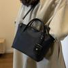 Popular casual texture niche design versatile handbag bag fashionable simple solid color commuter messenger women's bag