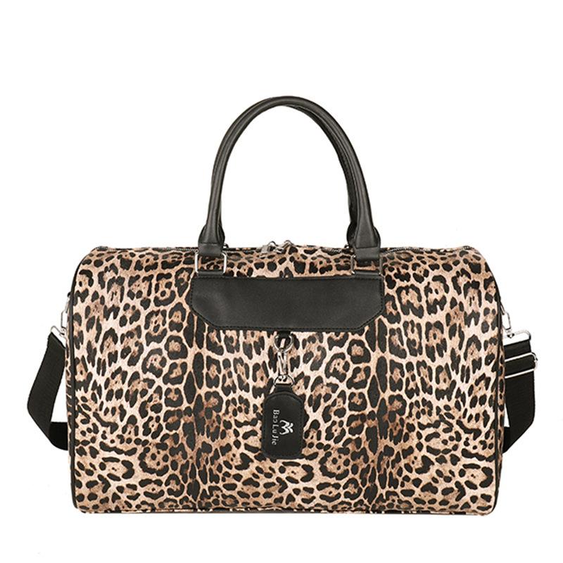 Это нишевая ручная дорожная сумка с большой вместимостью и складной ручкой с леопардовым принтом