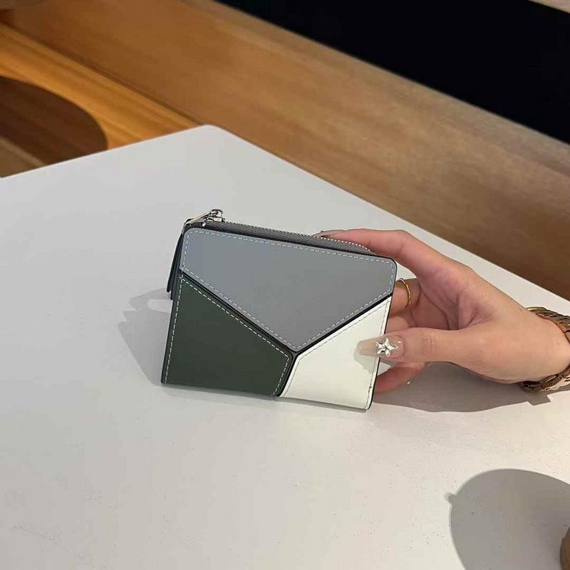 2025 New Genuine Leather Wallet Head Layer Leather Women's Handbag Short Style Simple Color Contrasting Geometric Splicing Women's Wallet