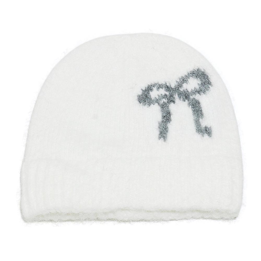 Baotou hat female Korean version bow knitted hat autumn and winter face small cashmere wool hat warm ear protector cold hat children
