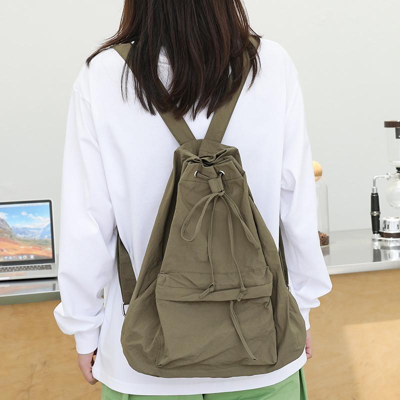 IELGY Korean Version of Casual Literary Canvas Backpack, Fashionable Nylon Solid Color Small Fresh Drawstring Backpack
