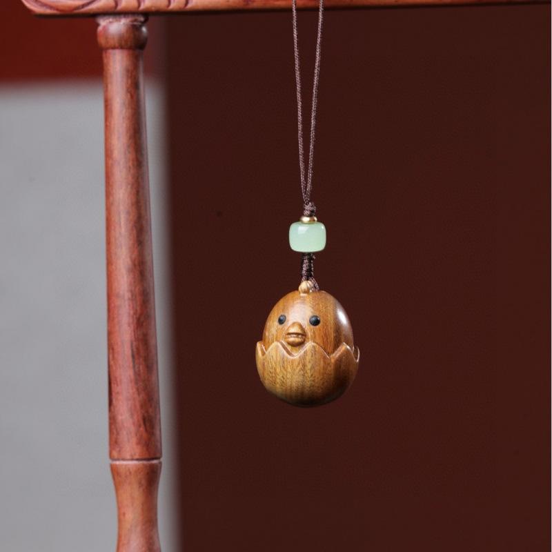 Twelve Zodiac Animal Charms Green Sandalwood Set: Rat, Ox, Tiger, Rabbit, Dragon, Snake, Horse, Sheep, Monkey, Rooster, Dog, Pig.