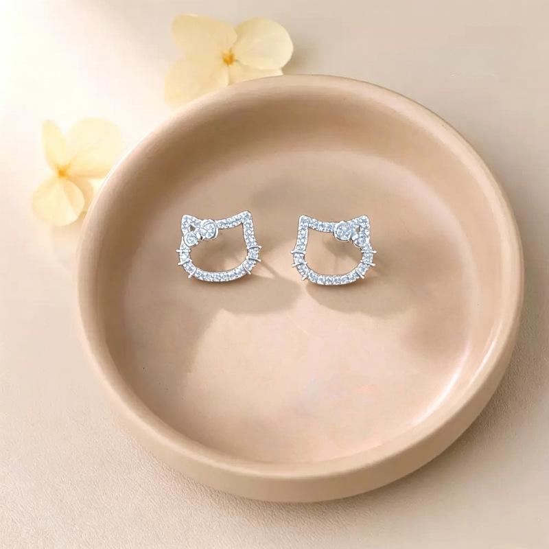 Серебряные гвоздики Hello Kitty Xiao Yin Jia S999: Серьги с полым дизайном KT-мультфильм, бриллианты, легкая роскошь