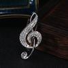 Креативная женская брошь в форме музыкальной ноты, блестящие стразы, инкрустированная булавка, платье, костюм, шаль с лацканами, значок, пальто, аксессуары