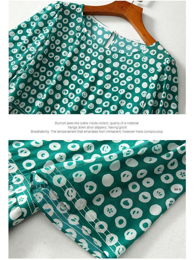 Шелковое платье средней длины в горошек