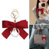 Fashionable Pearls Heart Shaped Pendant Keychain with Ribbon Bowknot Perfect For Young Girls Seeking Unique Accessories