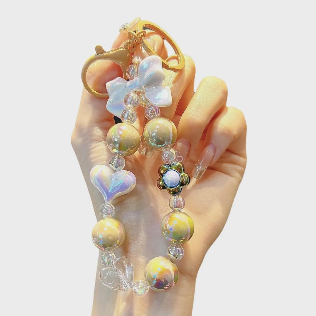 Брелок для ключей в виде цветного бисера в форме сердца с подвеской-бантом