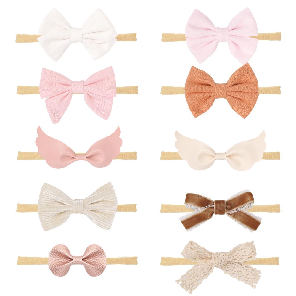 Комплект детских повязок на голову из нейлона и хлопка: Повязки на голову из льна и банта в подарочной коробке.