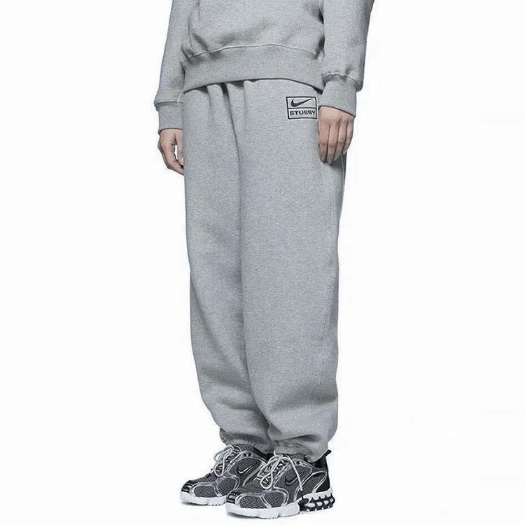 Nike X Stussy спортивные штаны серые унисекс брюки DJ9491-063